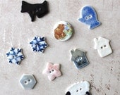 SALE...Handmade Porcelain Button Medley 4: Ten Assorted Buttons. Bear Cub, Mitten, Snowflakes, Houses, Flower, Dog, Sheep, Geometric