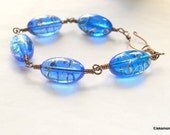 Wire work bracelet hand painted blue gypsy beads