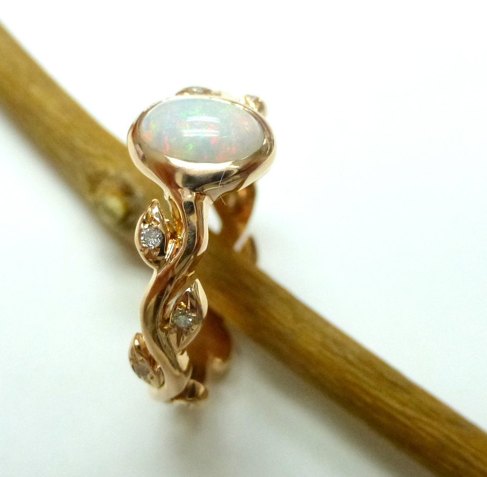 Engagement ring.  Opal engagement ring.  Leaf engagement ring with opal. 14k yellow gold.
