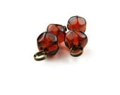 Handmade glass bead pair /  Faceted amber
