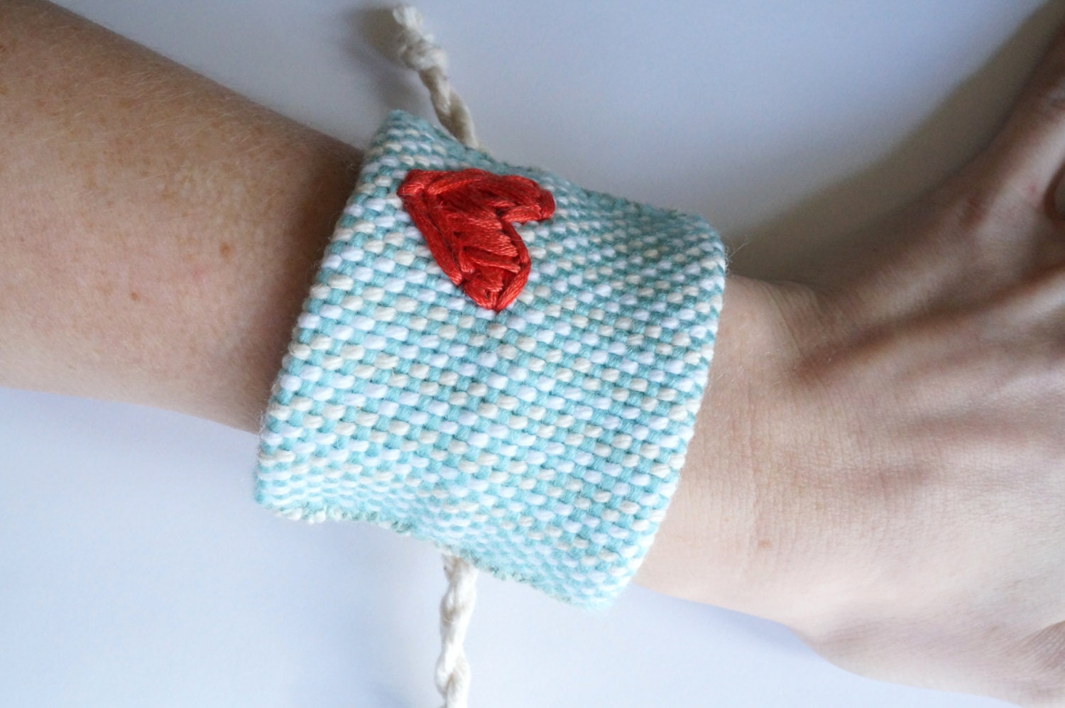 Handwoven Aqua Cuff Bracelet with Red Heart