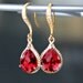 Ruby Red Teardrop Crystals Set in Gold with Crystal Detailed French Earrings