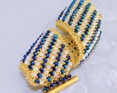 Ruby Sunday - Bracelet with Swarovski crystals,pearls,seed beads and gold plated 5 strand clasp