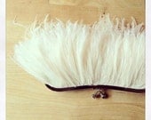 Ivory Ostrich Feather with curved frame