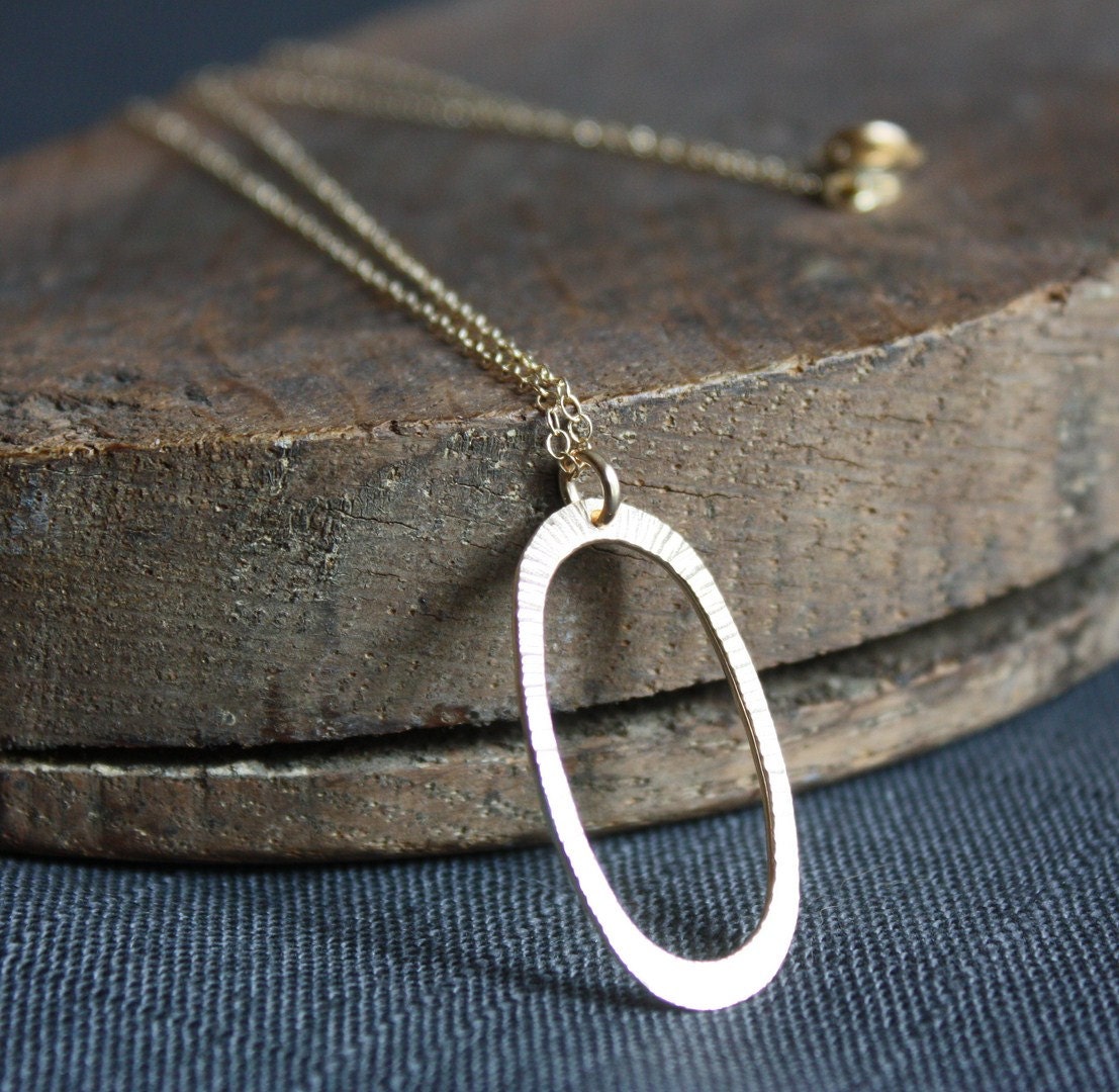 gold textured oval modern pendant necklace