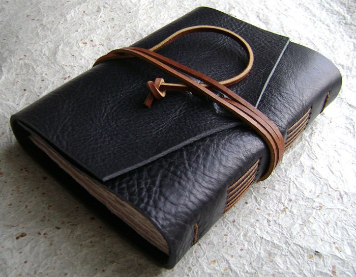 Leather journal, black with rustic orange-brown tie closure, handmade journal by Dancing Grey Studio on Etsy