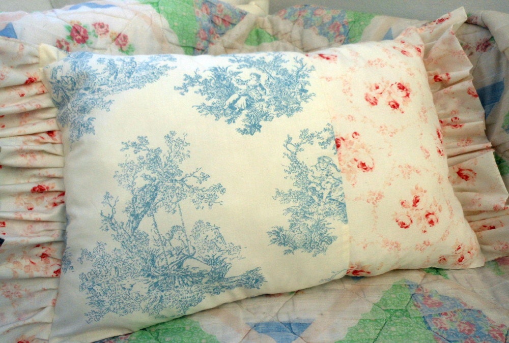 Beautiful blue and white Toile Pillow with a Touch of Pink Roses