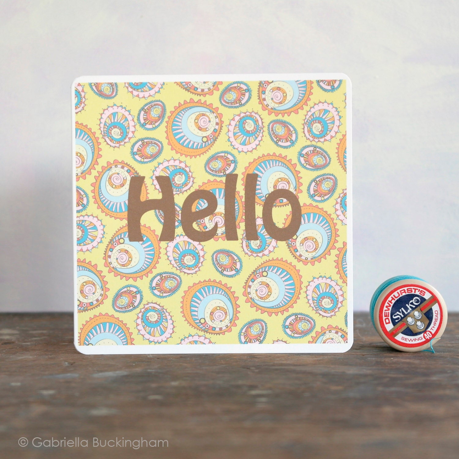 Say "Hello" to a friend with this bright retro style card