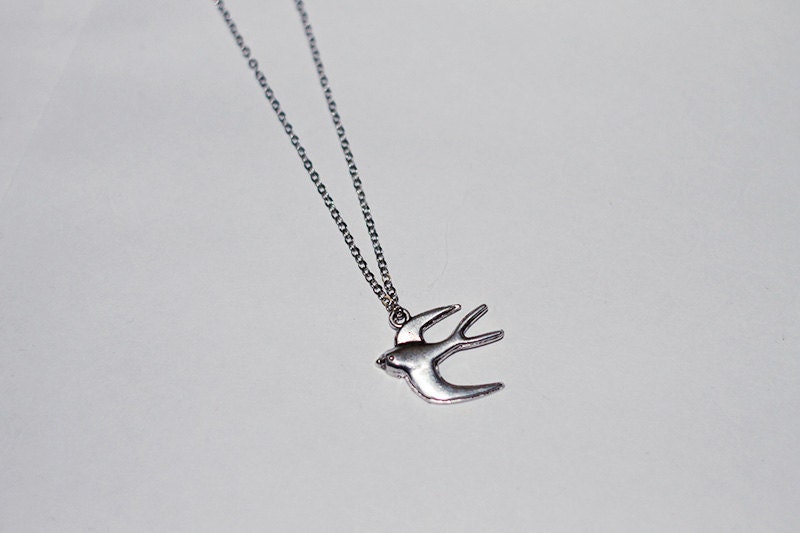 Flying bird necklace