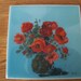 Blue ceramic tile with flowers