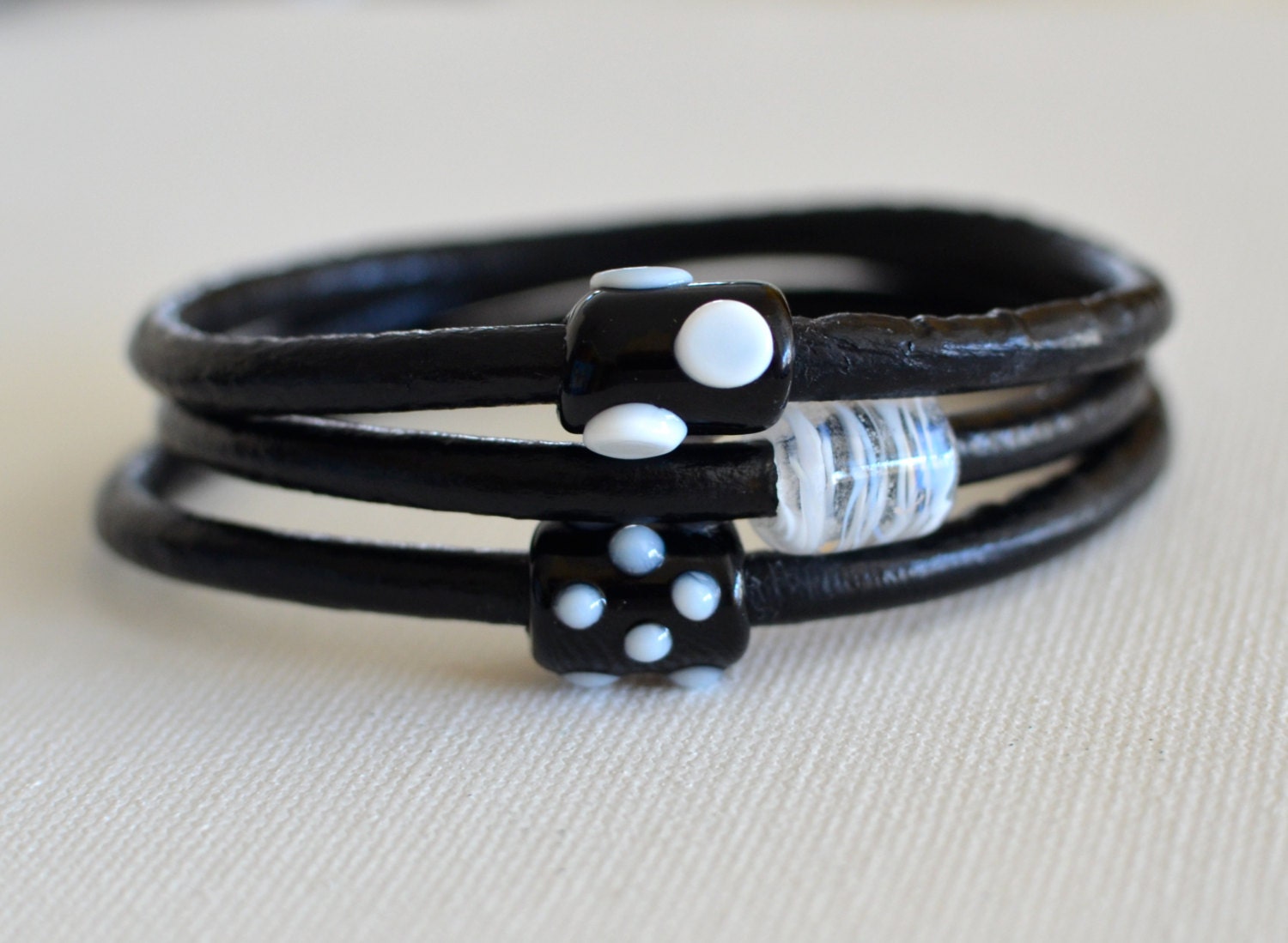 SET- Black and White Lampwork on Leather Bangles