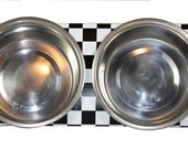Raised Dog Feeder - Black and White Checker made out of a skateboard deck