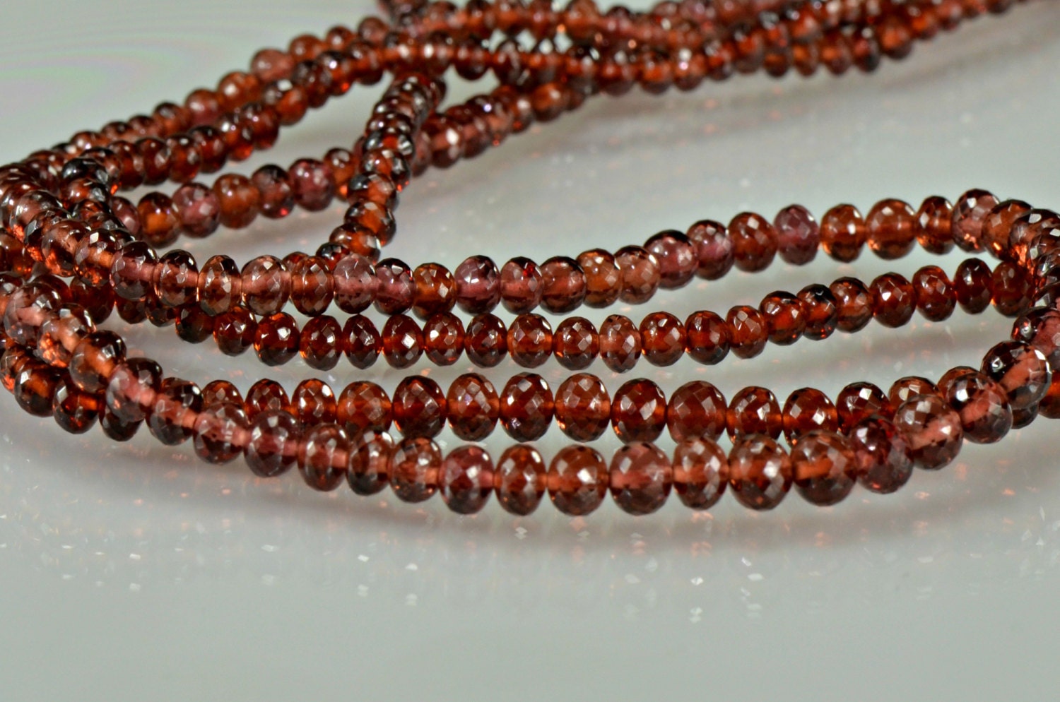 AAA Garnet Rondelles AAA Gemstone Rondelles   Micro Faceted  3-4.5mm, 8 inches