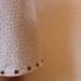 Studded white skater skirt with dots