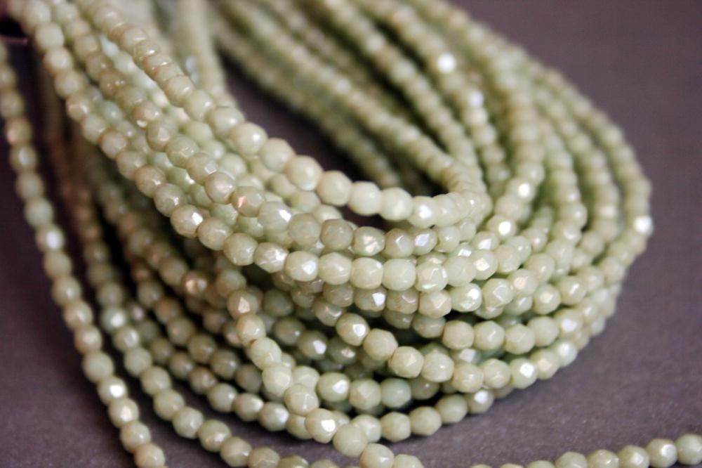 3mm Pale Green Star Dust Fire Polished Beads - Czech Glass