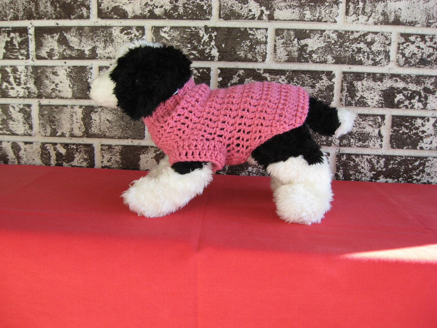 Dog sweater in pink size med. or large