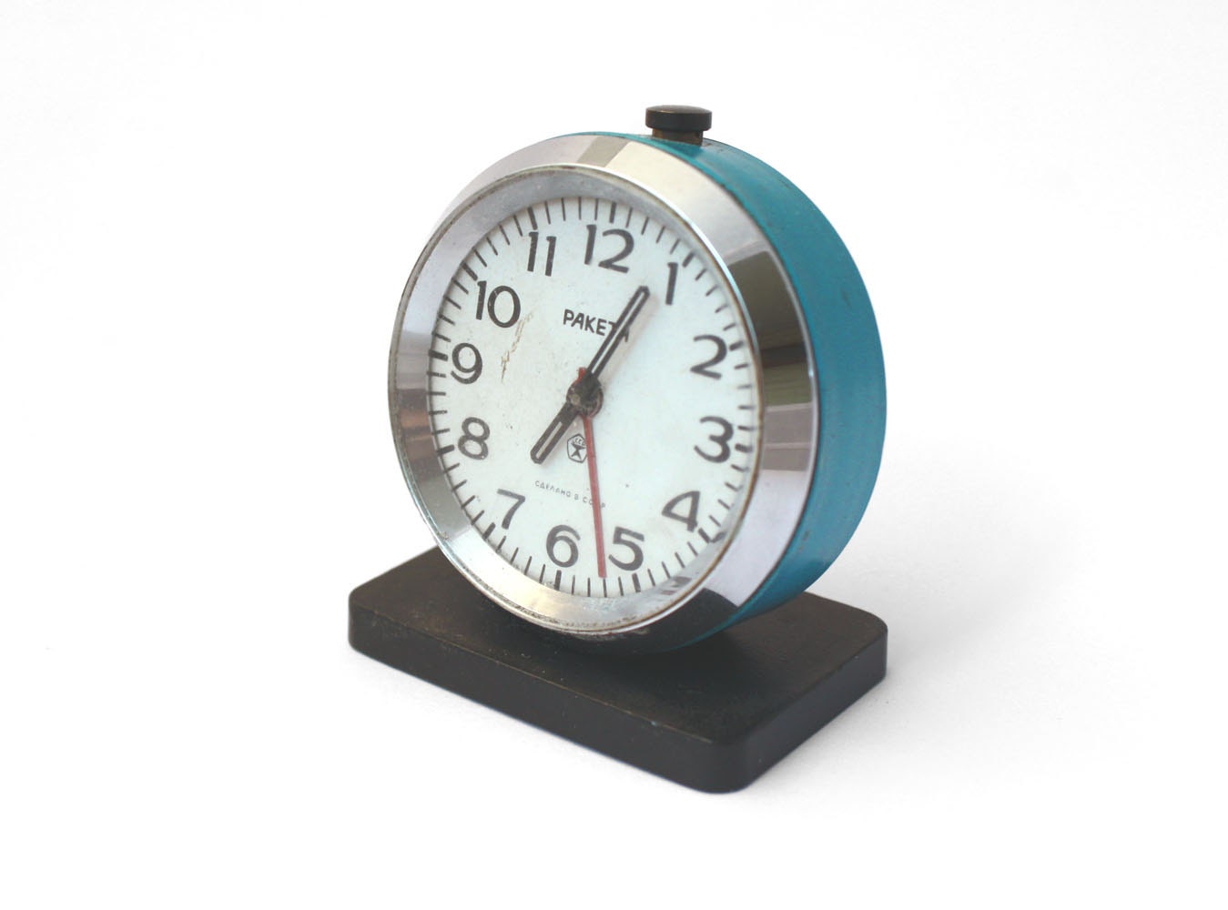 Vintage alarm clock, Russian mechanical alarm clock Raketa from Soviet Union period, blue clock