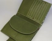 Large green leather purse with pine needle print lining