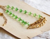 vintage gold rhinestone brooch, grandma's peridot green crystals / taylor necklace