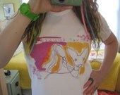 t-shirt saying "ever forward". size M. rachel awes.