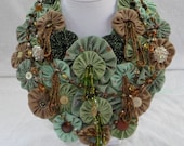 Sage,tan bib necklace with vintage fabric and jewelry