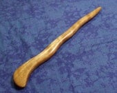 Hand carved wavy hair stick shawl pin in curly cherry wood