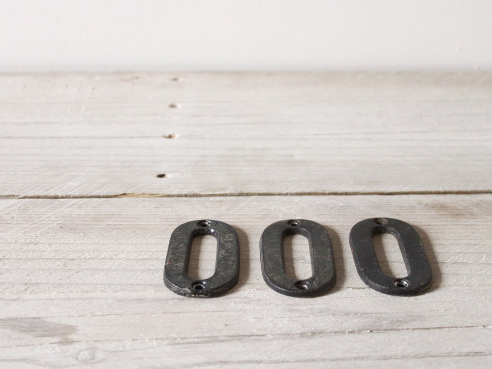 Vintage metal numbers, Three times zero