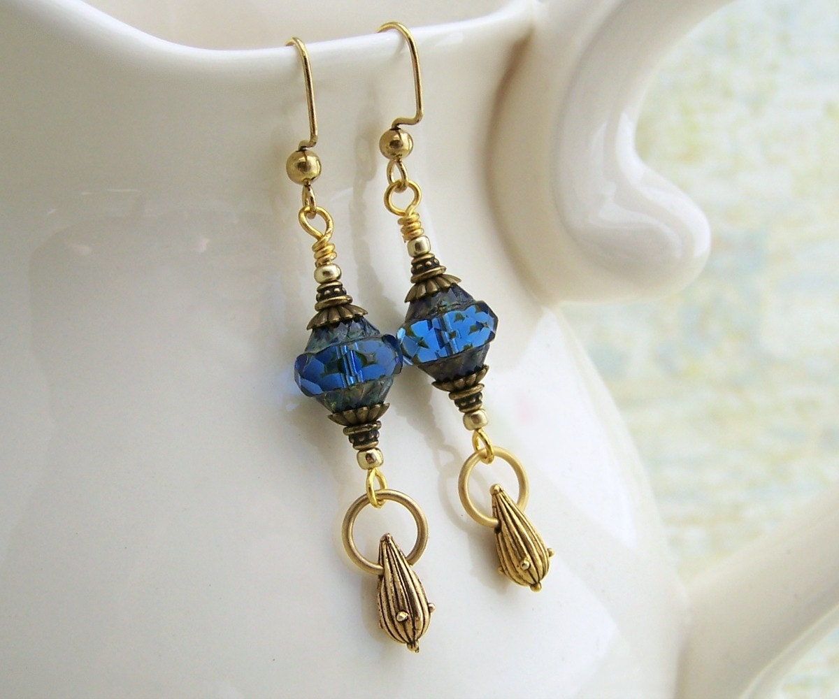 Blue and Gold earrings with turbine Czech glass beads and a brass bomb drop earrings