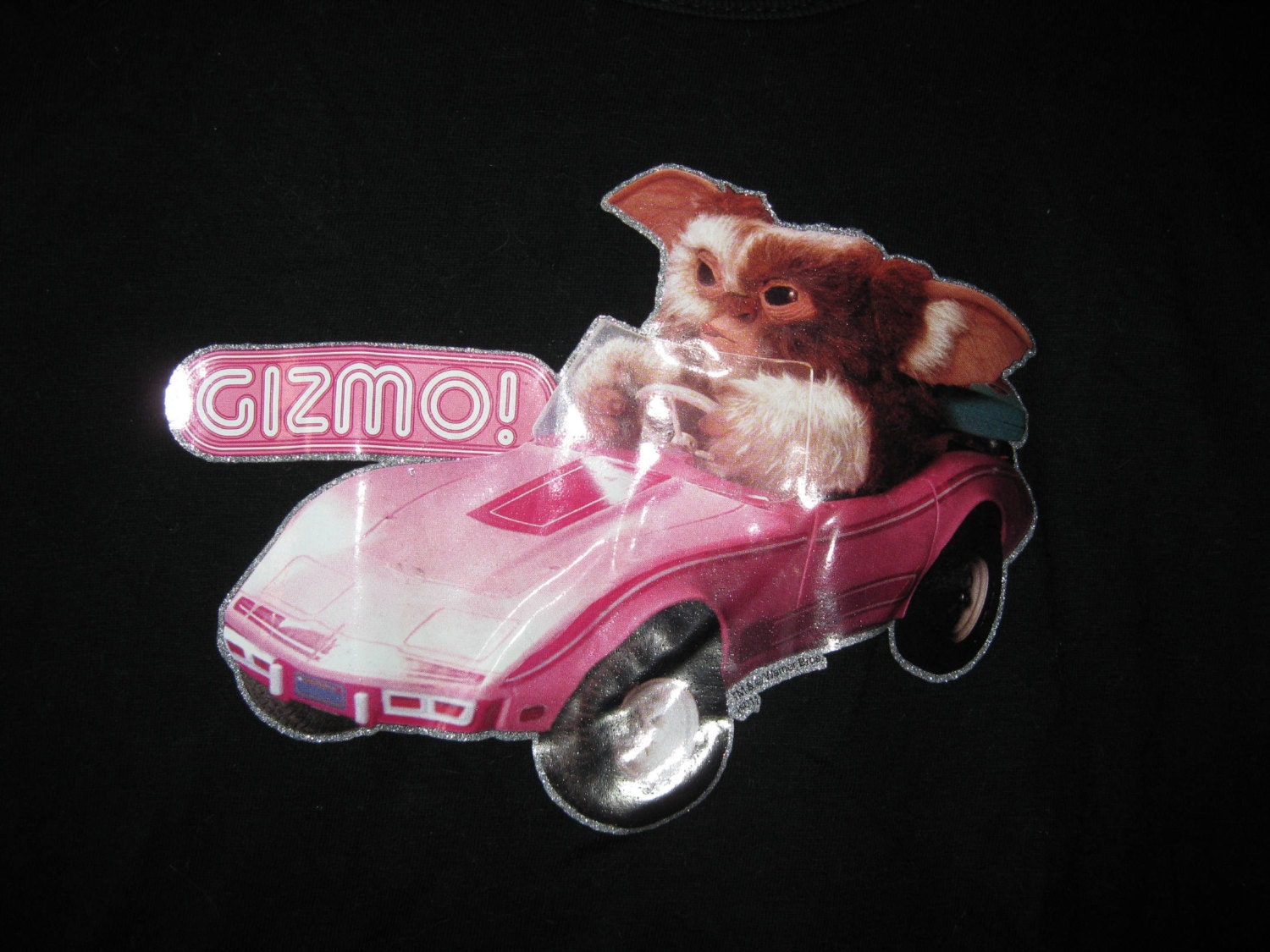 gizmo driving barbie car