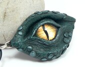 Dark Blue Dragon's Eye Pendant with a Golden Yellow Glass Eye