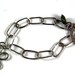 Sterling Charm bracelet with daisy and toggle--all hand forged