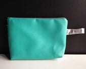 super large turqouise faux leather cosmetic bag with anchor zipper and waxed cotton lining