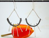 steel and silver earrings