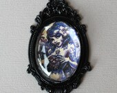 Beautiful Maiden Micheline Pitt  Shrunken Head Oval Brooch