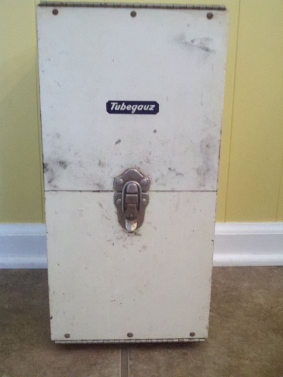 Vintage white metal medicine 1956 Tubegauz