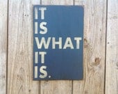 Wooden sign It is what it is sign made from reclaimed plywood