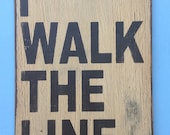 Johnny Cash I walk the line sign made from reclaimed plywood