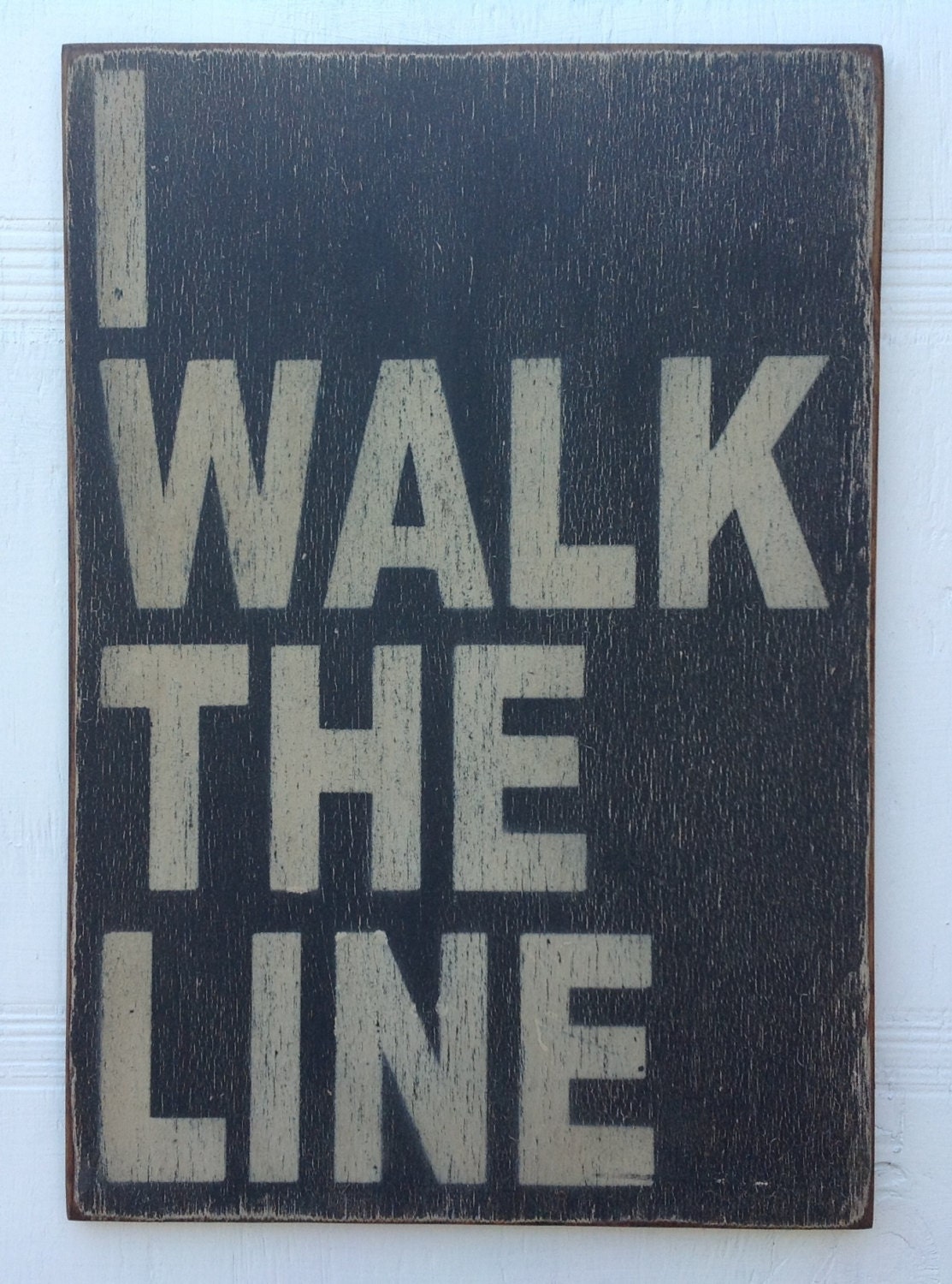 Johnny Cash I walk the line sign made from reclaimed plywood