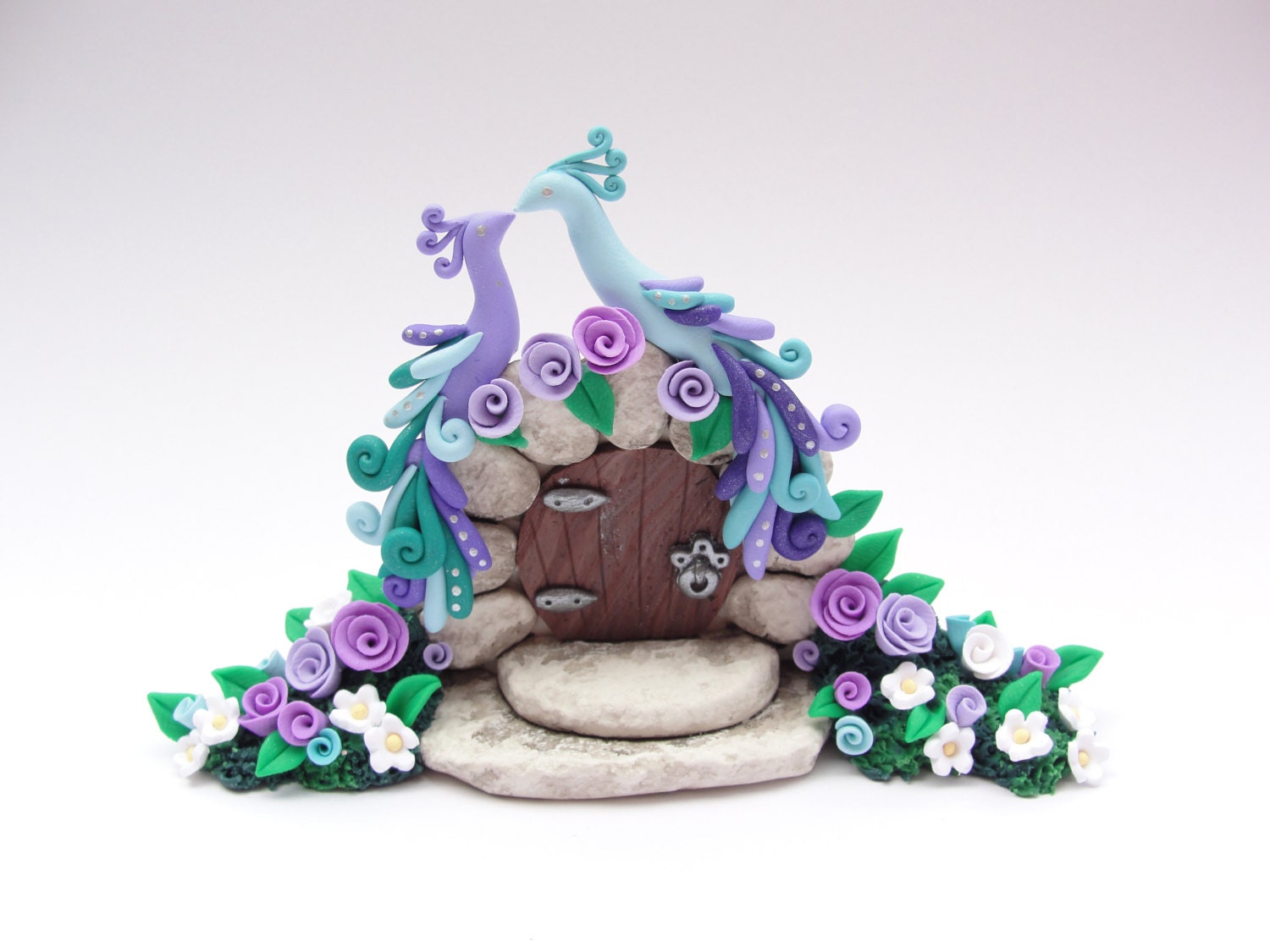 Wedding cake topper 2 peacocks sitting on fairytale gate in lilac and pale turquoise handmade from polymer clay