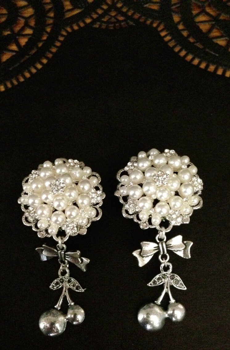 Pearl Rhinestone and cherry tunnels plugs