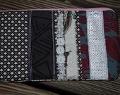 one of a kind patchwork pouch made with hand printed , new and vintage materials