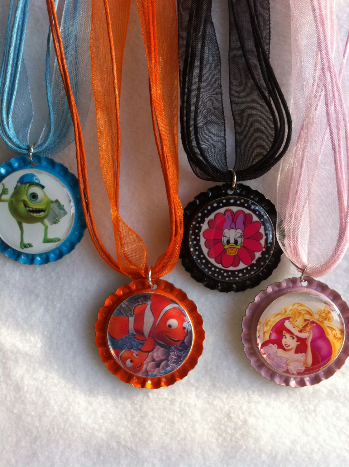 Whimsical  bottle cap with  ribbon strand necklace