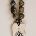 Turquoise necklace with wild boar ivory pendant