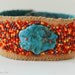 Beaded leather cuff with genuine turquoise stone