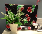 Large Waterproof Cosmetic Bag or Wet Bag of Oilcloth in Red Cherries on Black with Red Polka Dot Interior