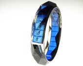 faceted handmade resin filmstrip bracelet . Royal blue countdown intro