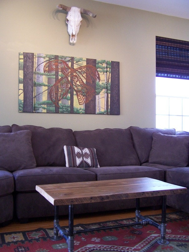 Salvaged Coffee Table with Barn Wood Beams and Pipe Base