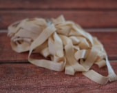 destash 3/4 inch champange ivory fold over elastic FOE large amount