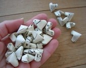 Yellowed Vintage Brahms Sheet Music Origami Hearts, set of 24.