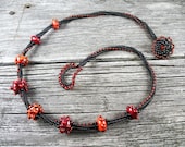 Beadweaving: Funky Black, Red, Orange Herringbone Rope Necklace w/ Lampwork Beads